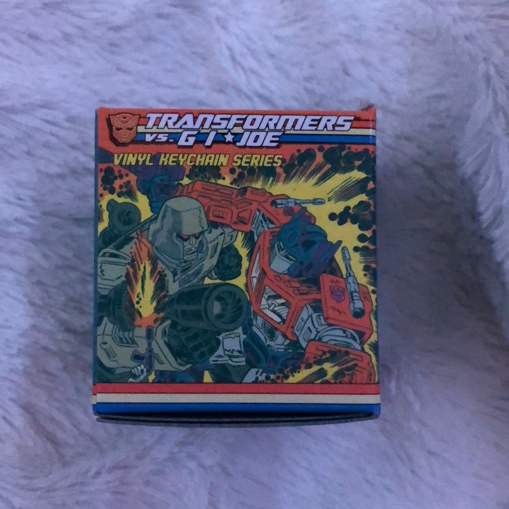 Transformers vs GI Joe key chain series